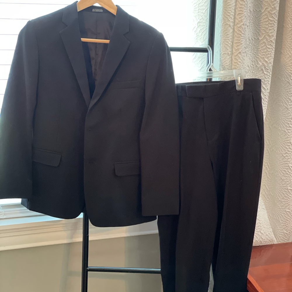 Boys black suit. Calvin Klein jacket 16, pants 14